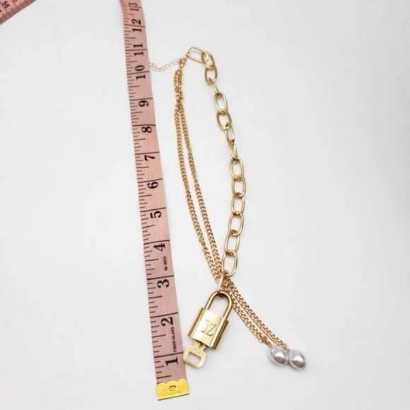 Authentic Louis Vuitton Lock and Key Gold Color with Gold Plated Chain Necklace - Picture 4 of 6